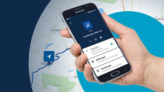 On the left, the white lettering HABBL on a dark blue background. On the right, a hand with a mobile phone and a road map underneath.