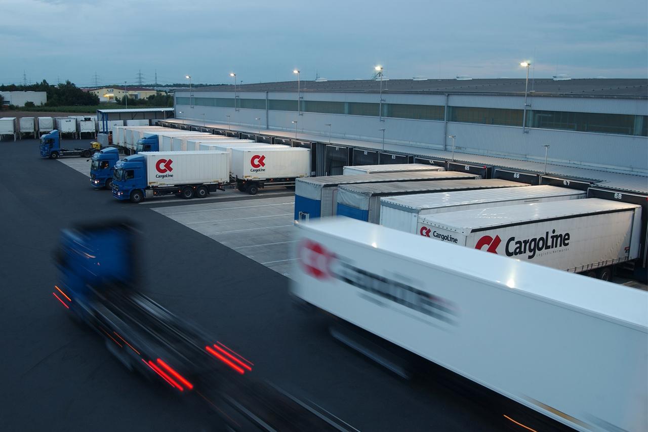 CargoLine trucks at ramps in a loading yard.