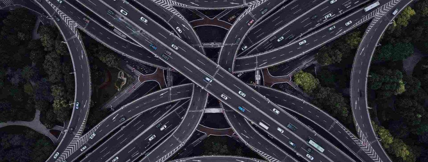 EIKONA Logistics Cloud is the central hub in the network of logistics cooperations. A street junction from a bird's eye view.