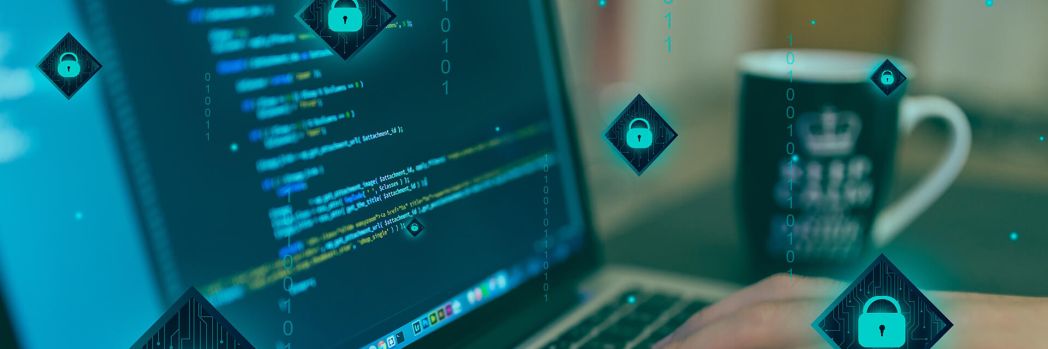 IT security should have high priority in companies Hacker on computer which is supposed to stand for high value of IT security in companies